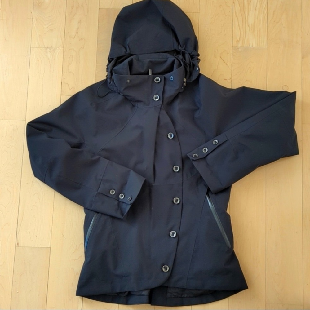 Nau Black Raincoat Durable & Sleek Design